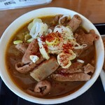 もつ煮ショップ - 100円のミニもつ煮 ♬に一味トッピング