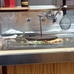 ｶｰﾌﾟお好み焼 - 鉄製の重しで圧縮