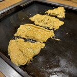 月島もんじゃ たまとや - お通しのオムレツ