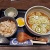 詫間