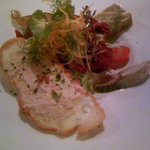 ビストロ旬亭 - 前菜。ポークのペーストのぬってある薄切りバケット