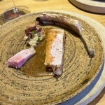 arkua - 岩手県産ハーブ豚の骨付きロースト ジビエのフォンで炊いたリゾット