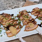 メロディア - 鴨肉の串焼き ローストアップルのコンポート