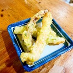 居酒屋 すずもと - お通し(ゲソの磯辺揚げ)