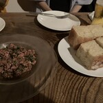 Nico - 蝦夷鹿のタルタルはマジえ〜ぞ！突き出しのふかふかフォカッチャと一緒にどうぞ。