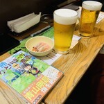 琥羊 - ハートランド生ビール650円とお通し300円。ひとりぼっち農園の漫画も置いてあります