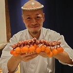 323670717 - 畑(はた)店主とちょうちん(玉ひも)