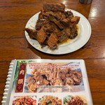 東北人家 - 豚背骨ガラ肉の特製醤油煮込み