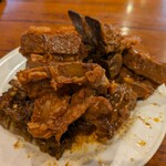 東北人家 - 豚背骨ガラ肉の特製醤油煮込み