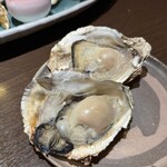 ニュー新橋ビル 牡蠣入レ時 - 焼き牡蠣(お通し)
