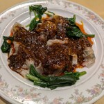 つくし - 四川水餃子　750円（税込）：自家製のガーリックソースとラー油の特性タレが美味しい！