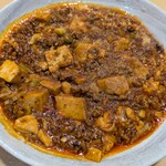 つくし - 四川マーボー豆腐　1,350円（税込）：つくしの一押し料理です。この辛さがやみつきになります。