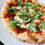 pizzeria TAKIBI - 料理写真:しし肉とわさび菜のピッツァ