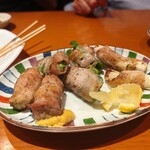 もつ平 - 野菜巻き(食べかけ)