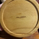 町家喫茶 三宅商店 - コースターの裏のロゴ