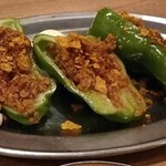 屋台屋 博多劇場 海浜幕張店 - 月替わりのおすすめ。ピーマン肉詰め風