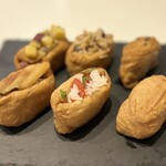 おいなり食堂 - 優しい酢飯に、程よい甘さのお揚げ
しっかり味の滲みた具材はどれもおいしく…
手作り感が温かい(*´-`).｡oO♡
美味しい創作お稲荷さんです♪( ´▽｀)