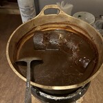 蔵人厨 ねのひ 名古屋駅前店 - 味噌おでん。ほぼ具を食べた後です。。20センチくらいの大根が入っていて驚き！割って食べました。話のネタにぜひ頼んでみてください。おいしいです。