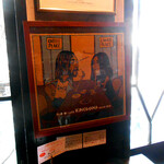 樹の花 - その席の壁に貼られたイラスト