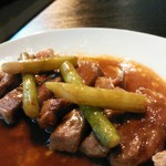 Aged pork and asparagus with garlic butter sauce