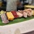 立食い寿司 根室花まる - 料理写真:二階建てほたて、しめさば、北寄貝、漬けまぐろ、たまご、真イワシ