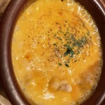 ワインの酒場。ディプント - 雲丹と白子のアヒージョ