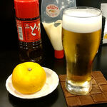 壱番館 - 生ビール　550円　サービスのミカン