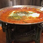 肉の山﨑 - てっちゃん鍋に、卵黄ととろろ芋は初めてです。