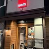 nom