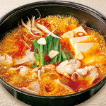 ふるさと居酒屋 村さ来 - 国産牛のもつ鍋　赤　※鍋の写真は2人前のイメージです。