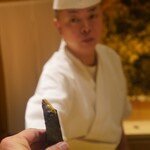 Amaki - 子持ち鮎甘露煮の海苔巻きと大将