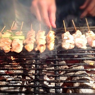 Enjoy the finest Yakitori (grilled chicken skewers) made with attention to detail, including the salt, charcoal, and grilling method.