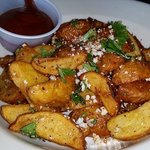 cocina - Papas Fritas (potato wedges) with garlic, tajin queso fresco & habanero katsup