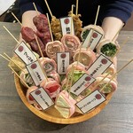 炭火野菜巻串と餃子 博多うずまき - 