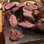 329876410 - 焼かれている時のお肉