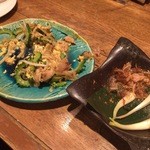 沖縄料理 あしびな～ - ゴーヤチャンプルーと島らっきょう（どちらも食べかけ）