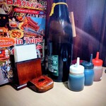 百福 - キープの焼酎と調味料たち