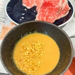 ひとりしゃぶしゃぶ 七代目 松五郎 - ゴマだれにニンニクチップを入れて味変〜