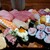 串かど - 料理写真:かなりわんぱくな握り方です
