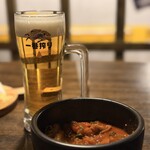 大衆酒場 もんろう - 自家製モツ煮込み