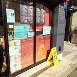 Spaghetti House MOSES - 玄関扉横のメニュー。