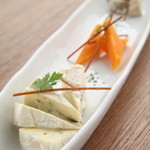 Three types of Mimolette, Camembert, and Gorgonzola