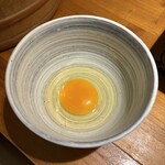 全席完全個室 吉蔵 - 雑炊セットの生卵　(税込440円)