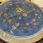 スブリデオ レストラーレ - チーズを削る