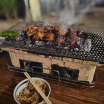 炭焼地鶏 山蔵 - もう一度焼きます
