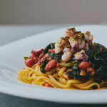 パスタ フレスカ ダンメン - 03_地ダコと由良産ワカメのトマト・七味風味