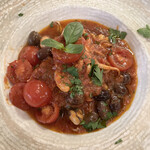 Tucci restaurant - スパイシー・トマト煮込み