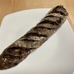 パンやきどころ RIKI - ショコラノアバトン ブラッドオレンジとマロングラッセを包んで ¥450