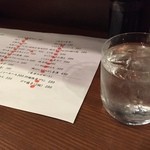 居酒屋 なだ番 - 定番の黒霧をロックで。並々注いでいただけてｗ