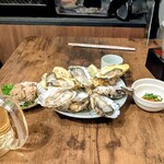 牡蠣小屋ろっこ - 生牡蠣＋レモン＋もみじおろし＆カニ身入りカニ味噌